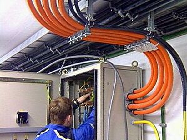 Electrician working on a commercial distribution installation