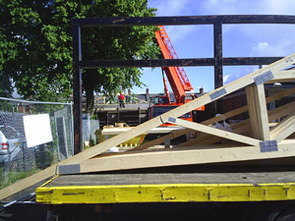 Roof trusses going up on a new build by Bagwells